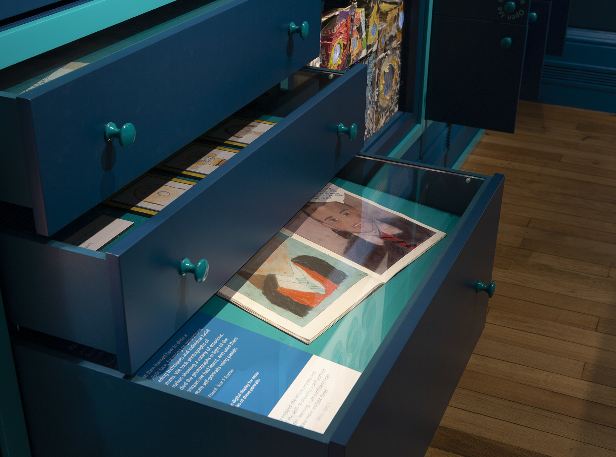 Blue Cabinet filled with children drawings